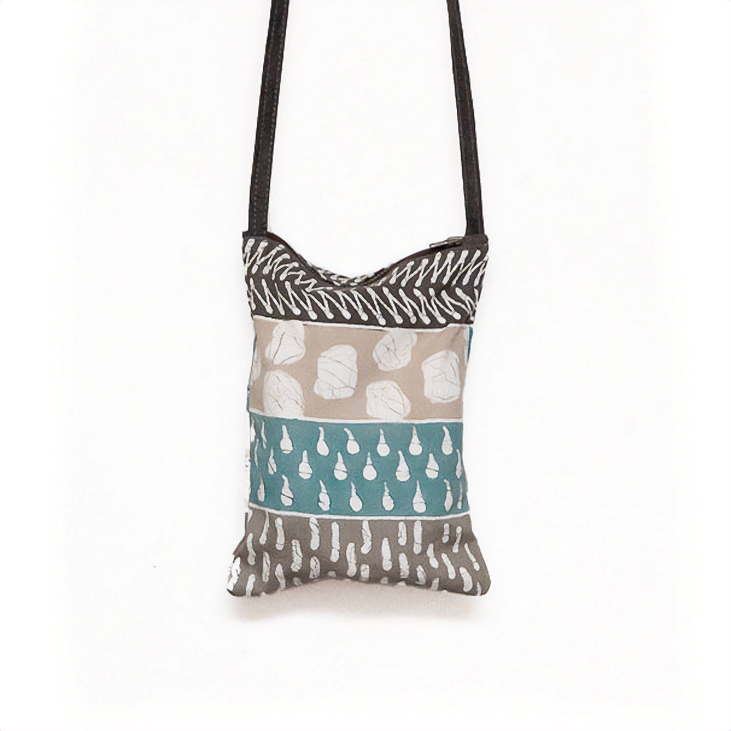 The perfect bohemian chic passport bag, adorned with a mix of African inspired patterns and made from 100% cotton.