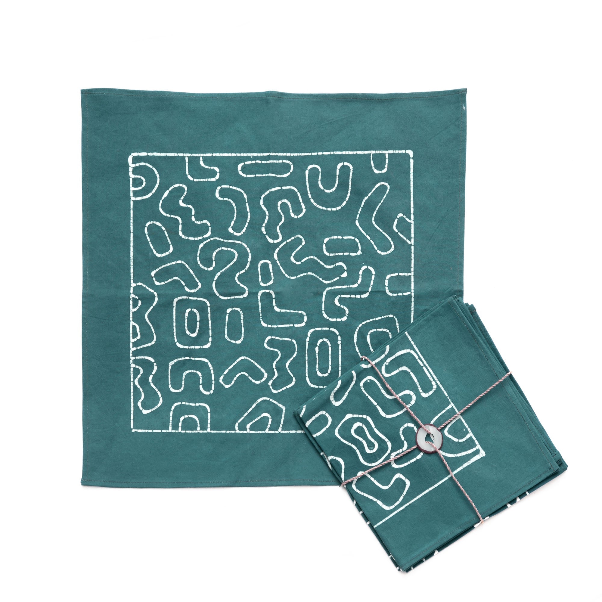 The perfect teal napkins, adorned in an intricate African inspired pattern destined to add colour to your sustainable style.