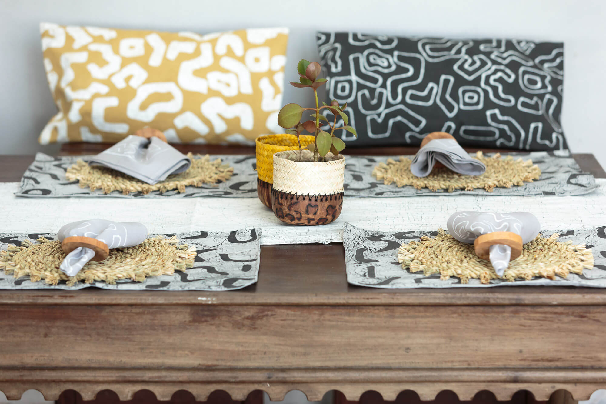 Beautiful charcoal coloured napkins adorned with an African inspired squiggle pattern to add fun and sustainable flare.