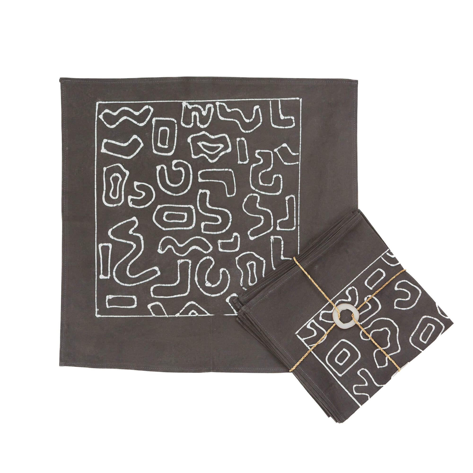 The perfect bohemian chic charcoal napkins adorned with a hand-painted squiggle pattern.