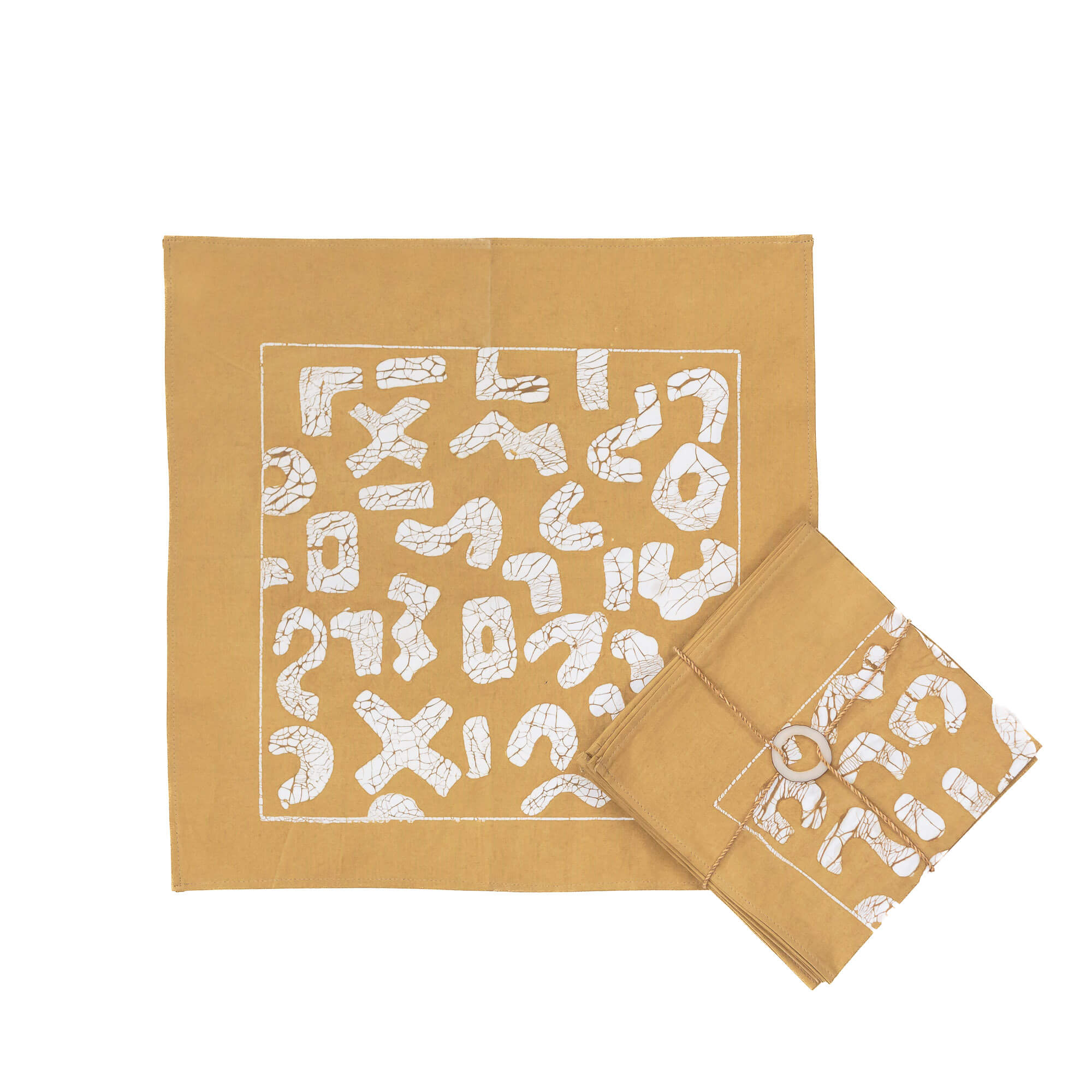 The perfect mustard yellow napkins adorned with a squiggle pattern.