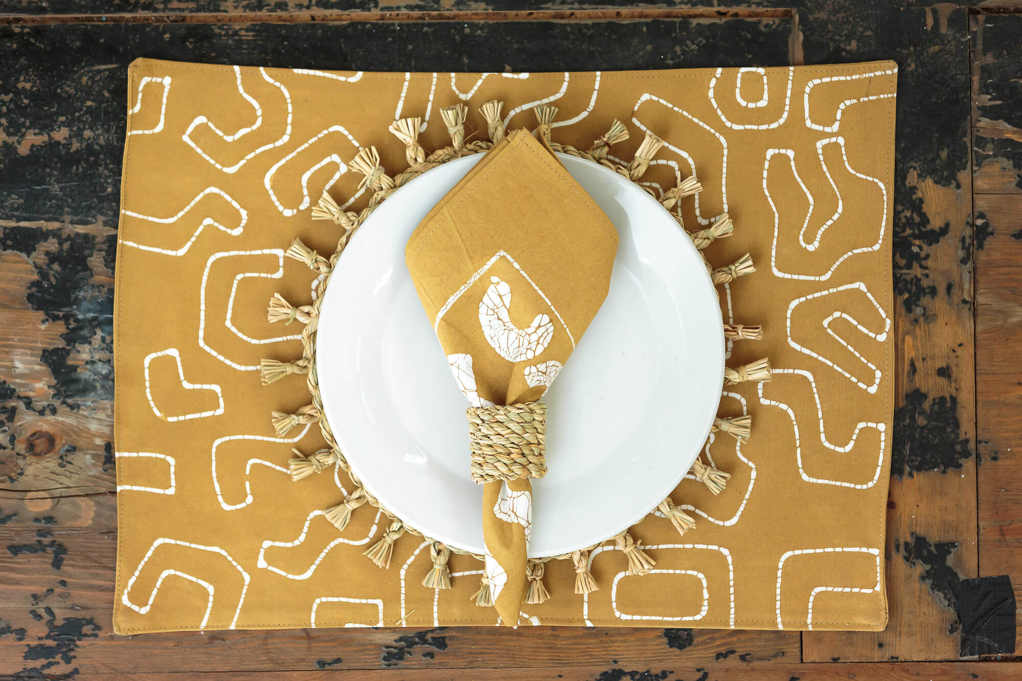African made mustard yellow napkins, made on 100% cotton to bring sustainable style to your kitchen table.