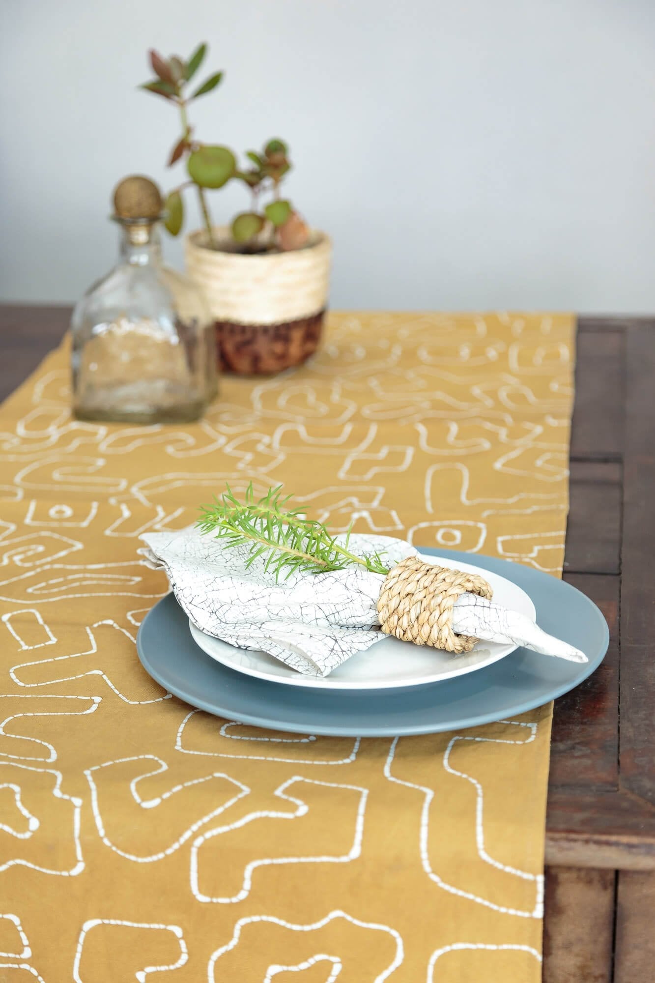 African made mustard yellow table runner made from 100% cotton to detail your dining room in sustainable style.