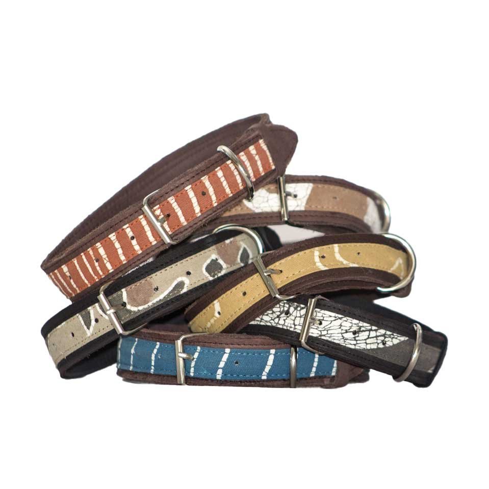 sustainably made dog collar made from leather and eco cotton in a bold yellow print.