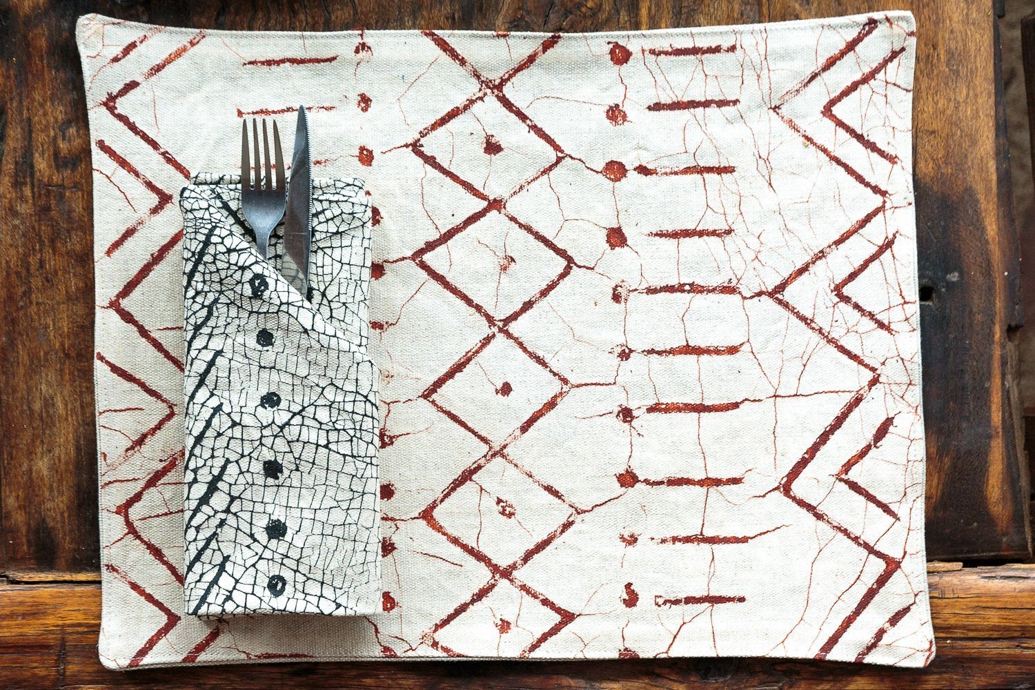African made white napkins adorned with black geometric pattens to add a touch of fun to minimalist kitchens.