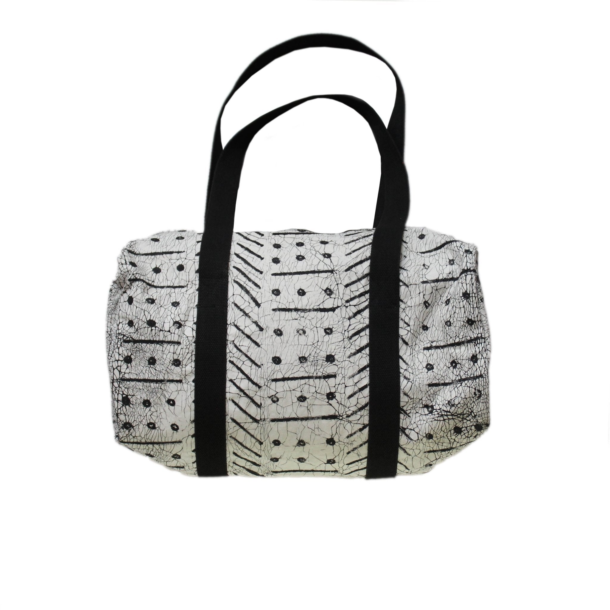 The perfect white weekend bag, made from 100% cotton with beautiful black patterning.