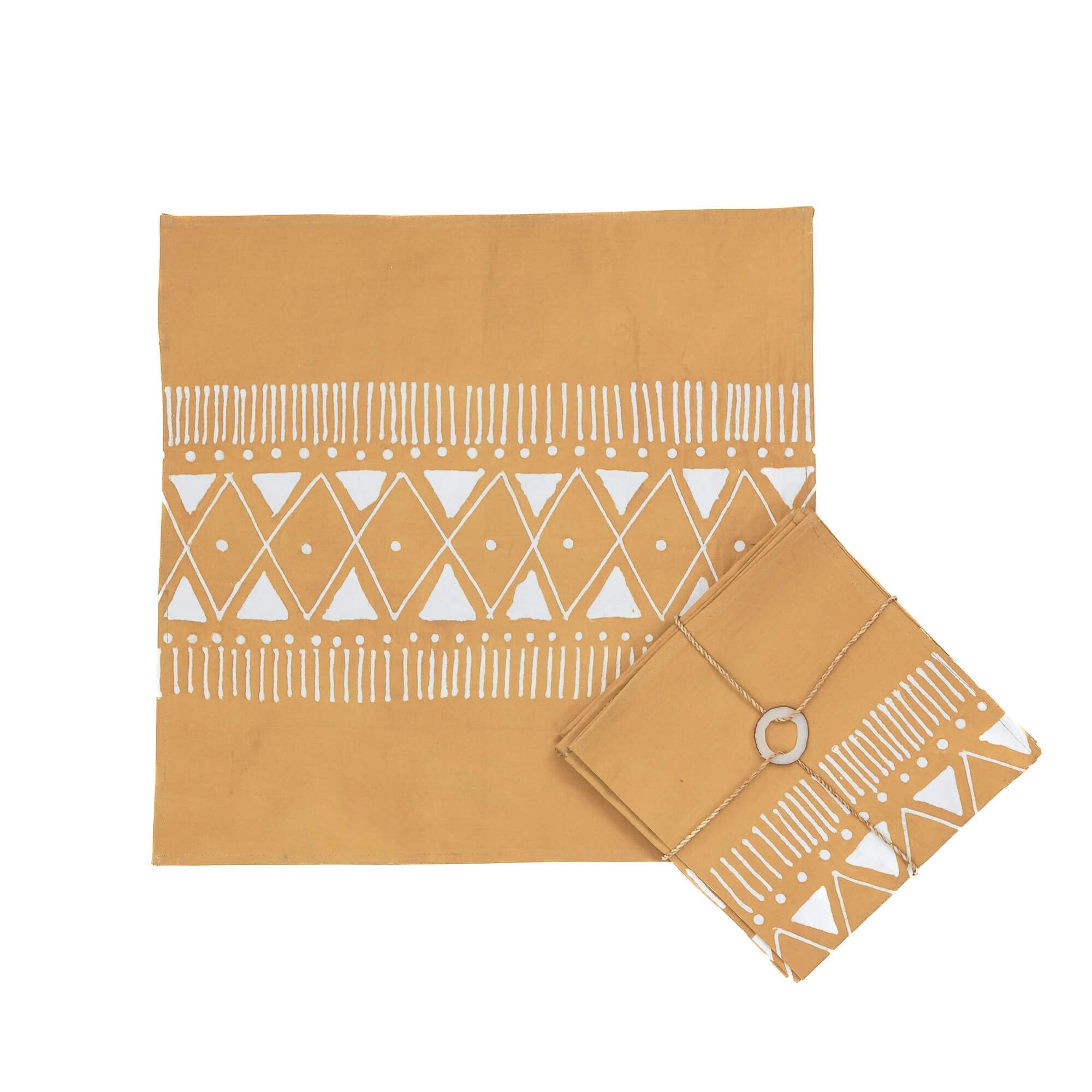 The perfect mustard yellow napkins adorned with intricate detailing, and the perfect commitment to sustainability.