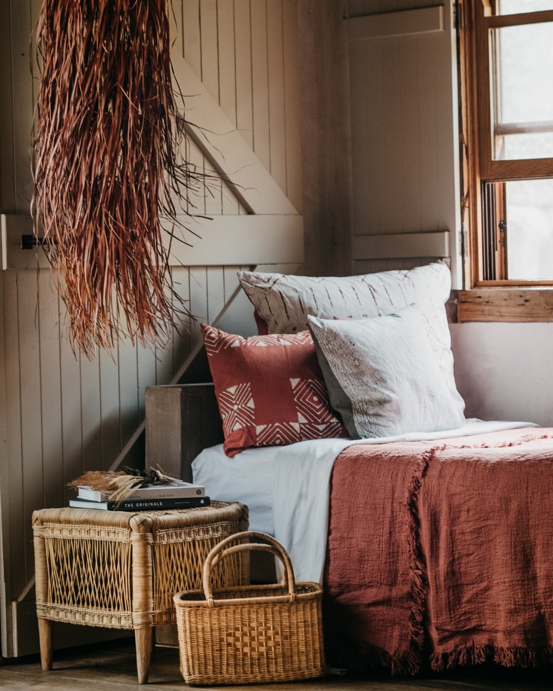 barn style home styling with rustic warm red cushions