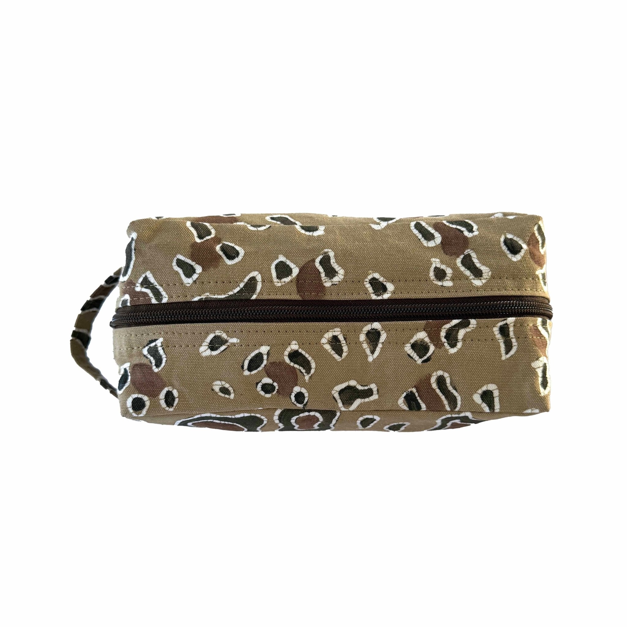 Travel wash bag in hand made leopard print with zip.