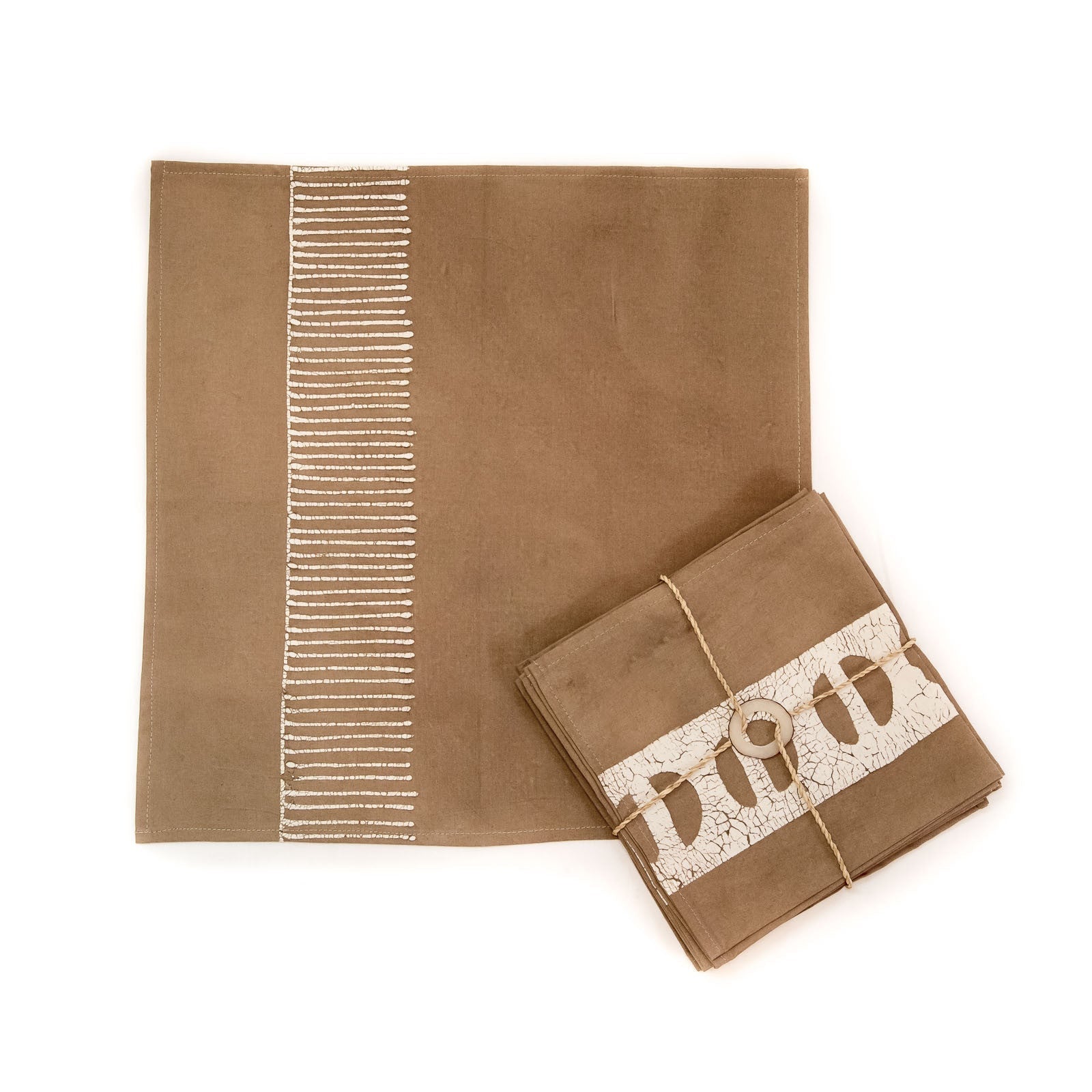 The perfect beige napkins adorned with detailed African prints and made sustainably on 100% cotton.