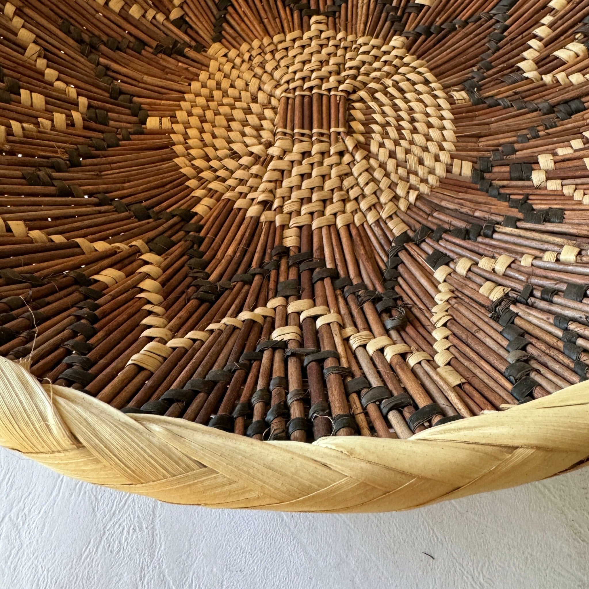 Wall art handwoven palm, African artistry wall art tonga basket.