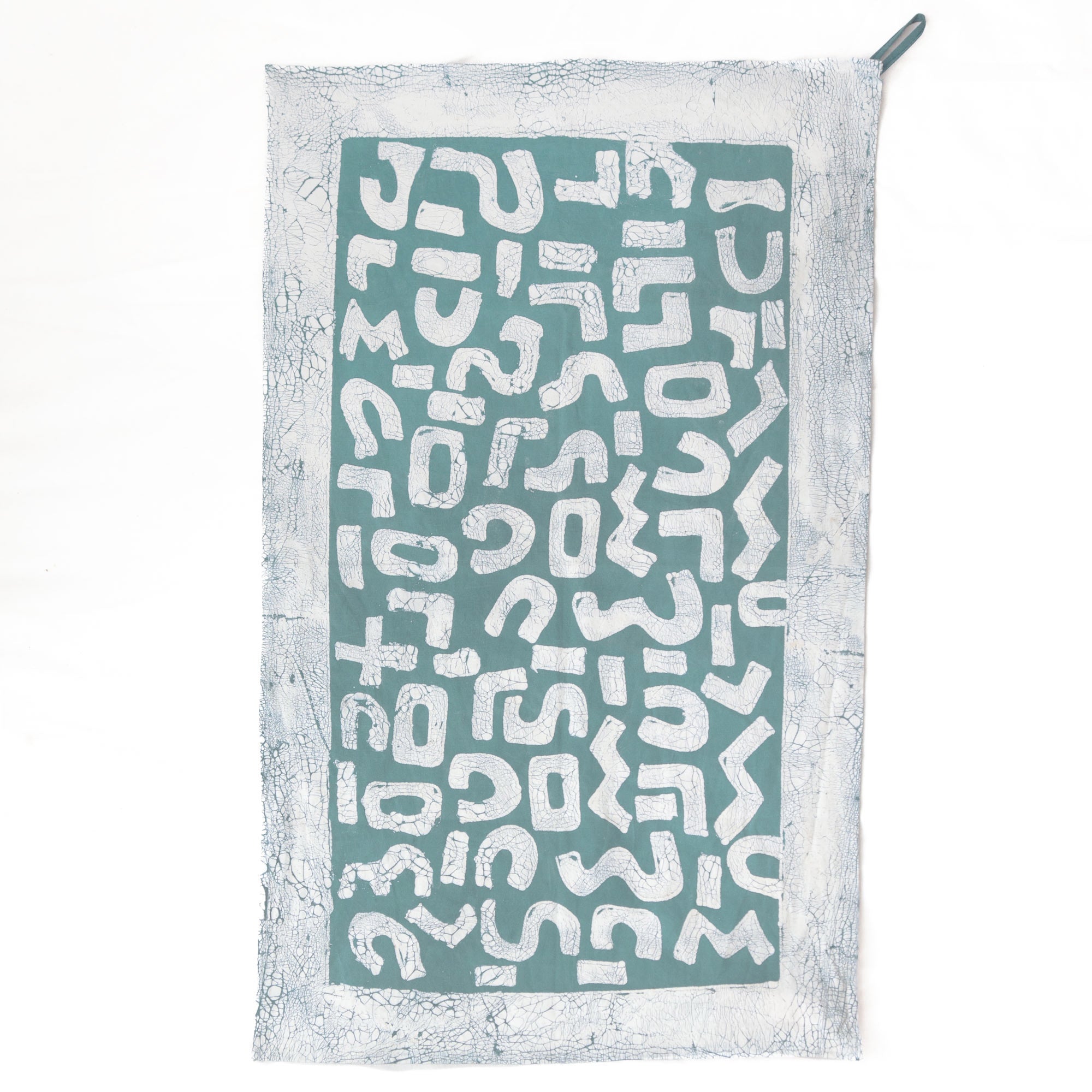 light blue eco friendly cotton fabric kitchen towel with bold african patterns